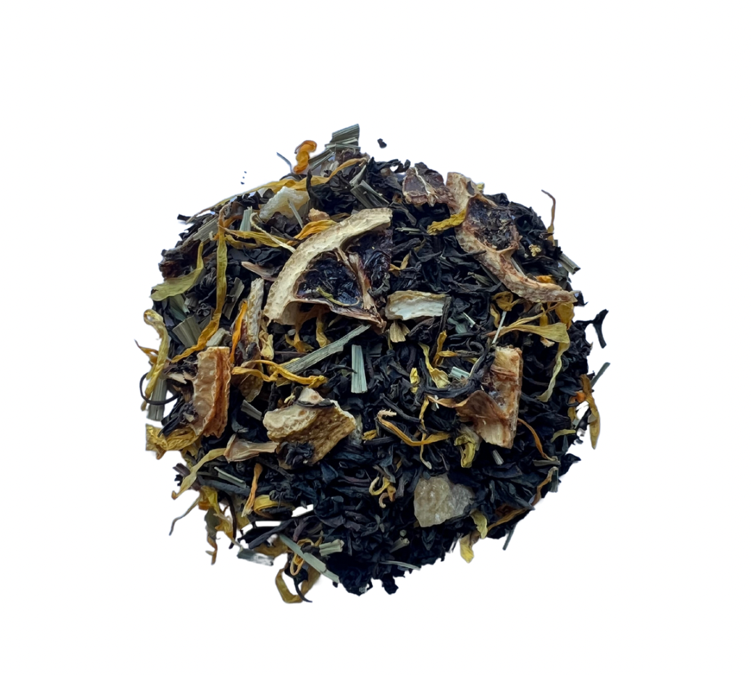 A close-up of Black Lemon tea leaves, showing black tea leaves interspersed with pieces of lemon and lime, and yellowish-brown lemongrass leaves.