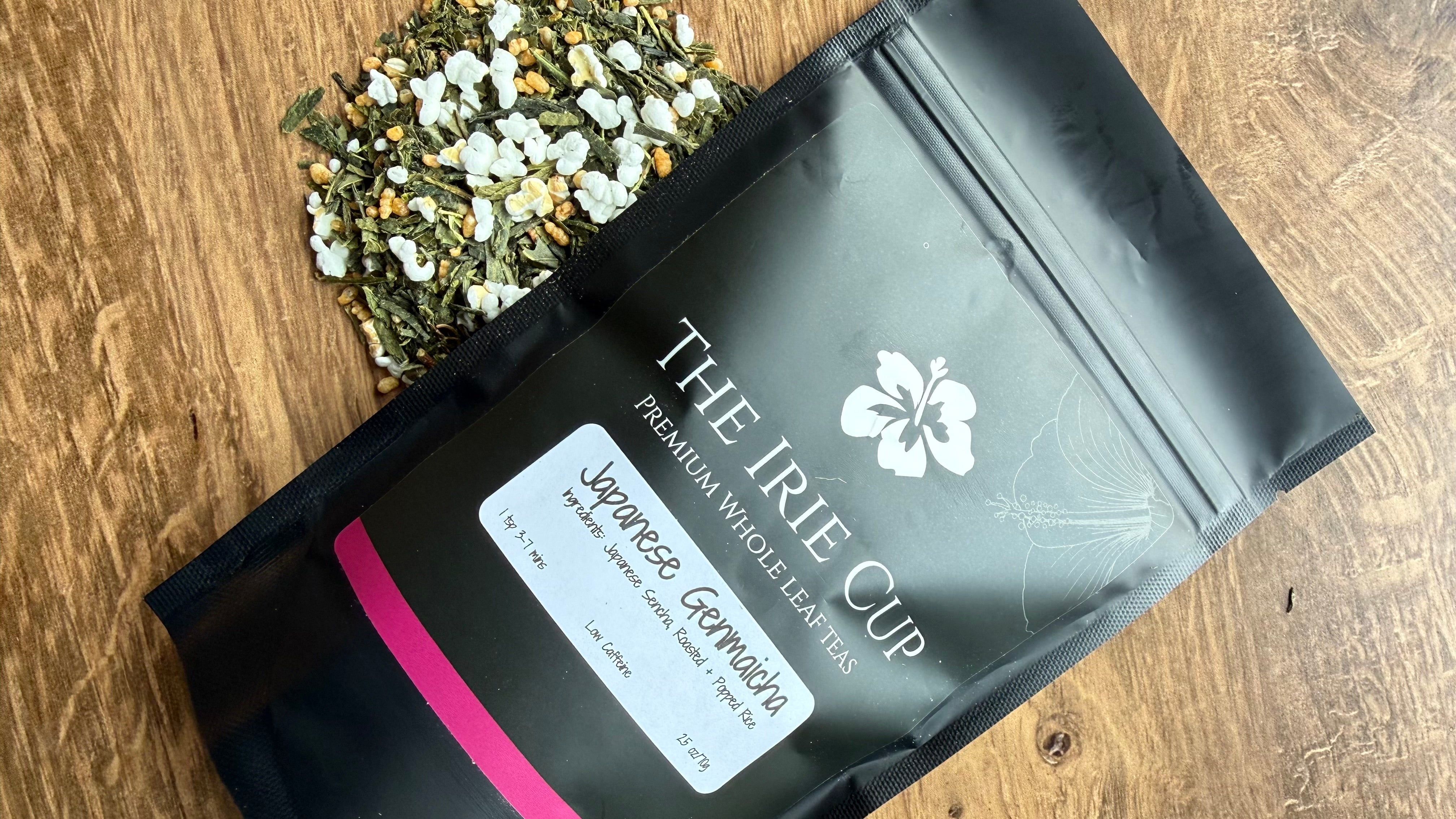 Black package of 'The Irie Cup' with a label on a wooden surface