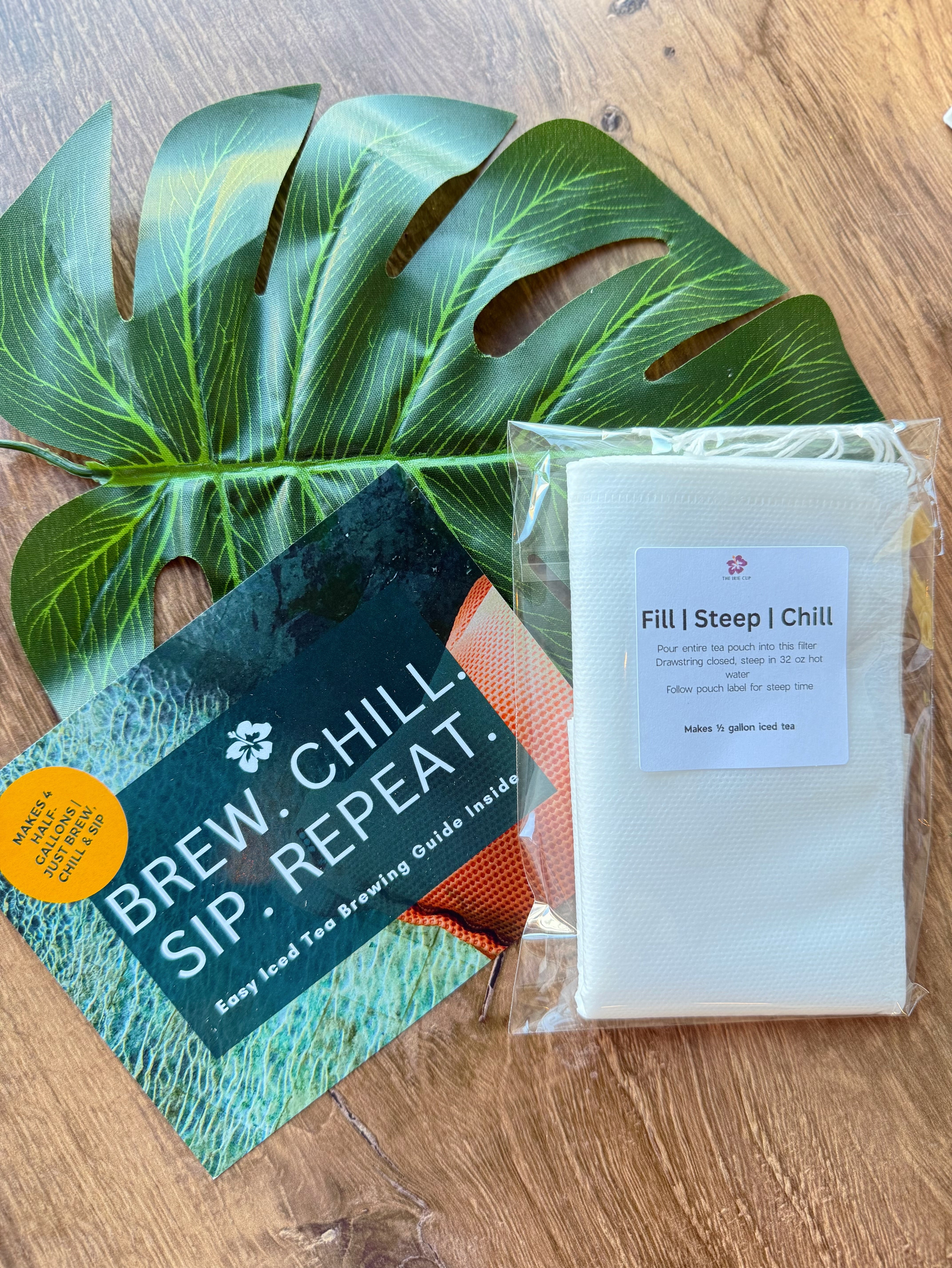 Caffeine-free loose leaf iced tea kit with Blood Orange, Blue Mountain Berry, Peach Honeybush, and Raspberry Lemonade blends