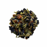 A dried herbal tea blend featuring lemongrass, apple pieces, and butterfly pea flower, with a vibrant blue hue from the butterfly pea flower.